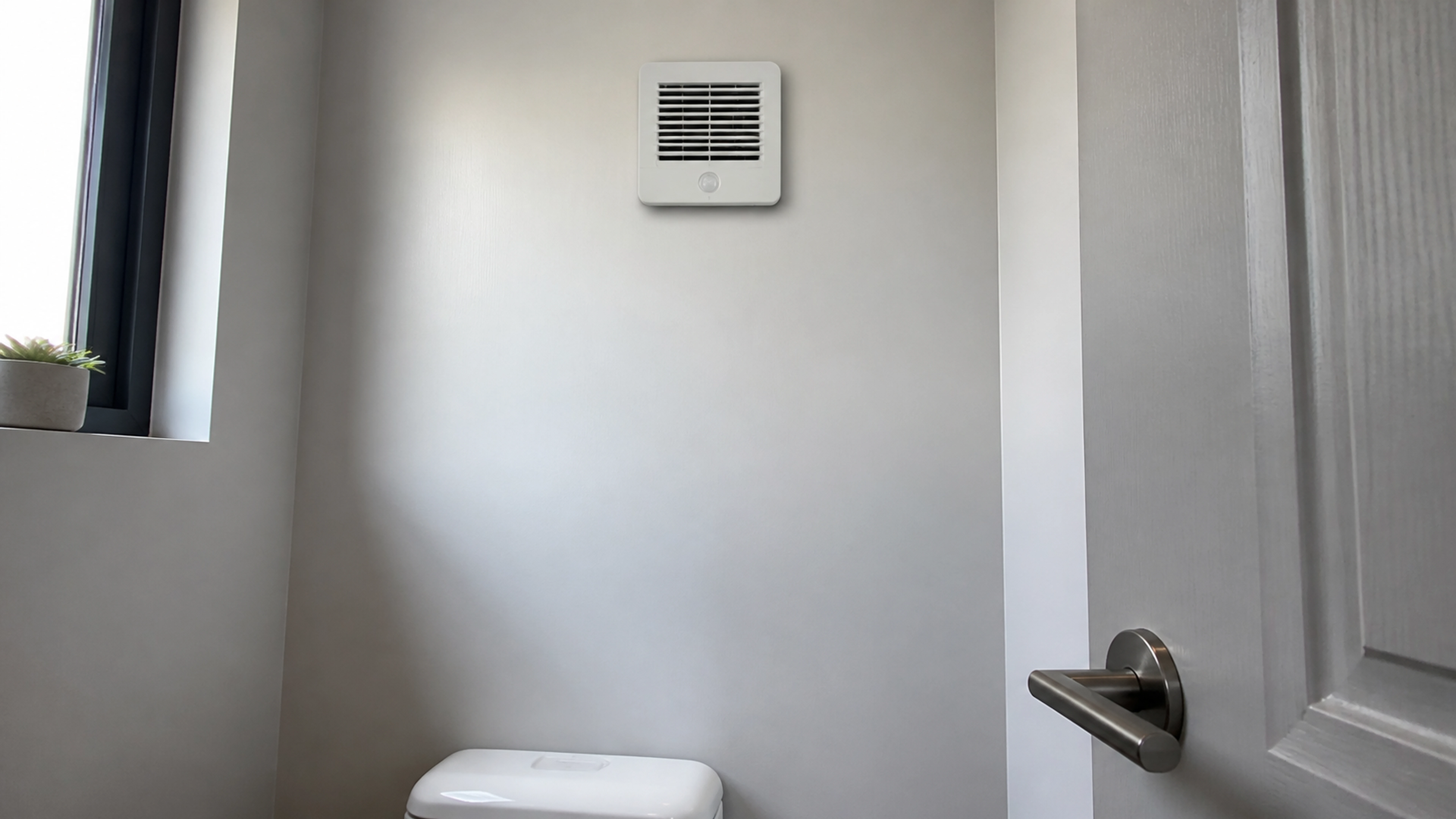 Illustration éditoriale pour l’article « Pourquoi choisir une vmc détecteur mouvement pour vos WC »